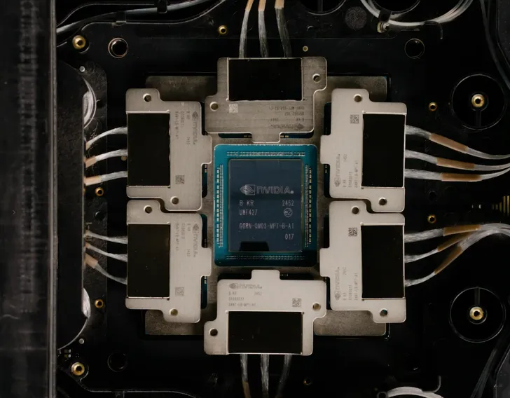 A NVIDIA processor labeled 'B KR UBF427' is centrally placed on a circuit board surrounded by multiple connected heat sinks.
